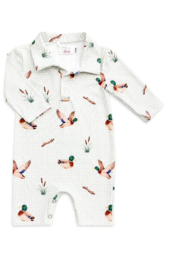 A long-sleeve baby romper in a white and light green gingham pattern, featuring a watercolor print of mallards and reeds. The romper has a snap-button placket at the collar and is shown flat against a white background.